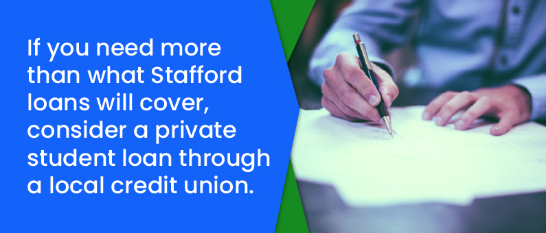 If you need more than what Stafford loans will cover, consider a private student loan through a local credit union - man in a button down shirt writing on an application